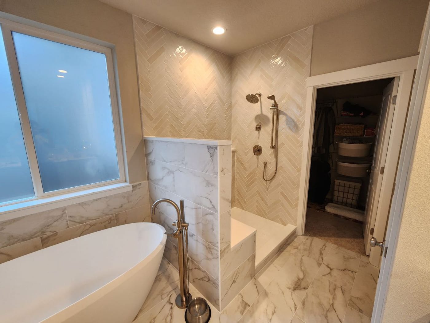 Herringbone marble, laid tight by Artemidas Renovation, Loganville